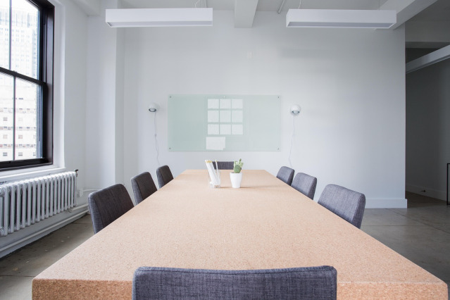 Bright conference room with table and chairs